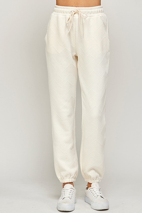 Cream hot sale jogger pants